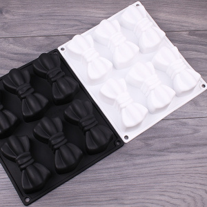 Форма для выпечки силиконовая 23,5*20,4*3,7 см /Бантики/ 6 ячеек